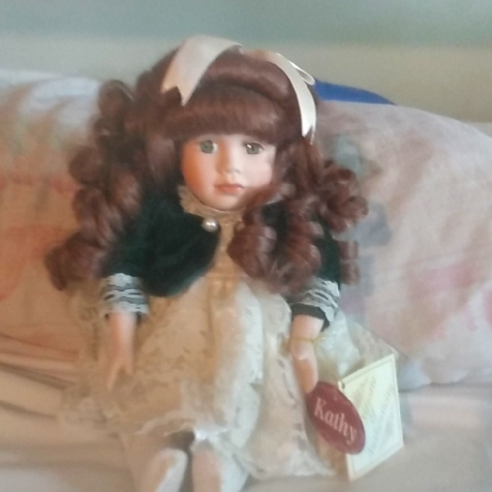 Porcelain music box girl doll.